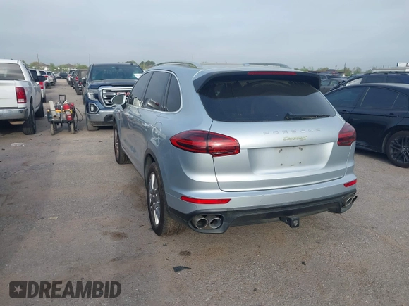 2016 Porsche Cayenne S E-Hybrid with VIN WP1AE2A26GLA59496, listed as a IAAI auction lot 41884022 with 85,386 mi miles and . Bid and sale history available at DreamBid. Image 3.