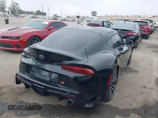 2021 Toyota Supra 2.0 with VIN WZ1DB2C07MW042723, listed as a IAAI auction lot 42635977 with 54,011 mi miles and . Bid and sale history available at DreamBid. Image 4.