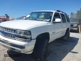 2003 Chevrolet Tahoe LS with VIN 1GNEK13Z13J131945, listed as a IAAI auction lot 42036677 with Not Provided miles. Bid and sale history available at carsss.com. Image 2.