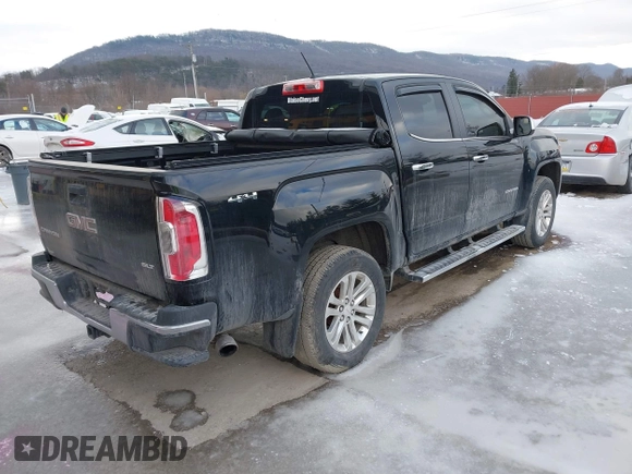 2015 GMC Canyon 4WD SLT with VIN 1GTG6CE39F1202730, listed as a IAAI auction lot 41510275 with 114,444 mi miles. Bid and sale history available at carsss.com. Image 4.