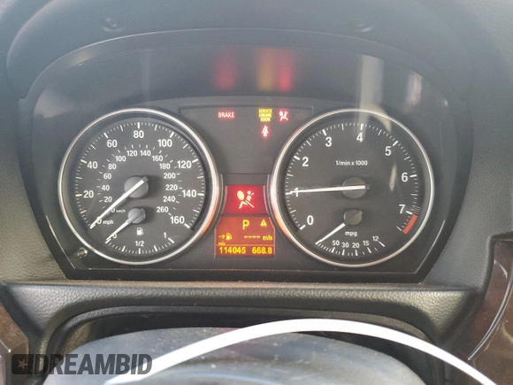 2010 BMW 3 Series 328i with VIN WBAPH7G50ANM52307, listed as a Copart auction lot 74597724 with 114,045 mi miles and Salvage Title. Bid and sale history available at carsss.com. Image 9.