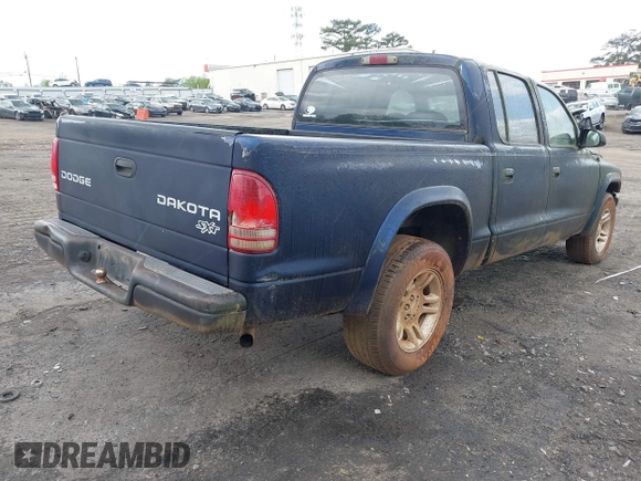2004 Dodge Dakota Sport with VIN 1D7HL38K34S782067, listed as a IAAI auction lot 42012642 with 113,921 mi miles. Bid and sale history available at carsss.com. Image 4.