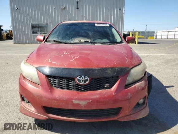 2010 Toyota Corolla z VIN 1NXBU4EE3AZ197969, wystawiony jako Copart lot #60699805 z przebiegiem 197 072 mil mil oraz Szkoda całkowita • Salvage title. Historia ofert i sprzedaży dostępna na DreamBid. Obrazek 5.