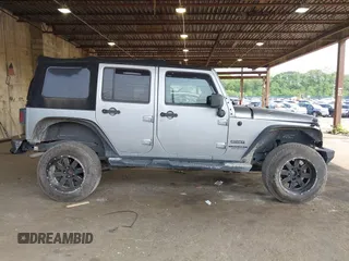2017 Jeep Wrangler Unlimited Sport with VIN 1C4BJWDG1HL591515, listed as a IAAI auction lot 42426201 with 124,131 mi miles and . Bid and sale history available at DreamBid. Image 13.