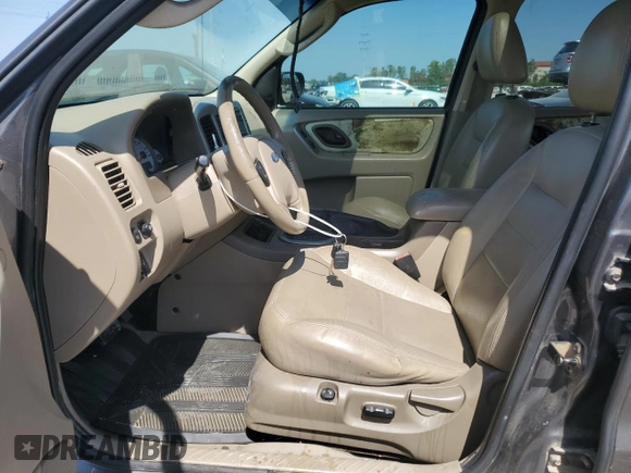2005 Ford Escape Limited with VIN 1FMYU94175KB94533, listed as a Copart auction lot 71092124 with 156,992 mi miles and Salvage Title. Bid and sale history available at carsss.com. Image 7.