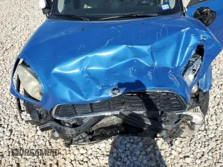 2011 MINI Countryman S with VIN WMWZC5C54BWL53955, listed as a Copart auction lot 52187405 with 124,470 mi miles and Salvage Title. Bid and sale history available at DreamBid. Image 12.