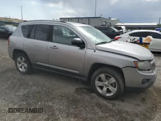 2016 Jeep Compass Sport with VIN 1C4NJCBA5GD612112, listed as a Copart auction lot 60039395 with 154,860 mi miles and Salvage title. Bid and sale history available at DreamBid. Image 4.