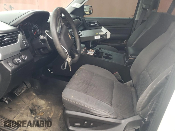 2016 Chevrolet Tahoe Commercial z VIN 1GNSKDECXGR130281, wystawiony jako Copart lot #42766985 z przebiegiem Nie podano mil oraz Szkoda całkowita • Salvage title. Historia ofert i sprzedaży dostępna na DreamBid. Obrazek 7.