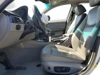2007 BMW 3 Series 328i with VIN WBAVC53537FZ79020, listed as a Copart auction lot 57387485 with Not provided miles and Salvage title. Bid and sale history available at DreamBid. Image 7.