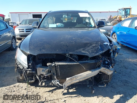 2014 Audi Q5 Premium with VIN WA1CFAFP4EA017515, listed as a IAAI auction lot 41000205 with 194,104 mi miles and . Bid and sale history available at DreamBid. Image 13.