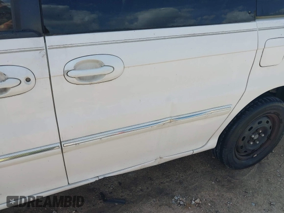 2005 Kia Sedona LX with VIN KNDUP131456634276, listed as a IAAI auction lot 42090209 with 185,754 mi miles and . Bid and sale history available at DreamBid. Image 6.
