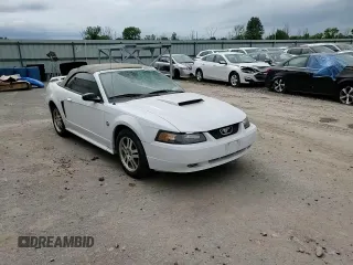 2004 Ford Mustang Deluxe with VIN 1FAFP446X4F238670, listed as a Copart auction lot 60922635 with 121,880 mi miles and Salvage title. Bid and sale history available at DreamBid. Image 14.