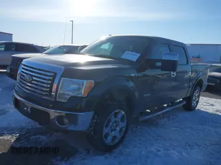 2011 Ford F-150 XLT with VIN 1FTFW1ETXBFA53080, listed as a IAAI auction lot 41632983 with 139,814 mi miles. Bid and sale history available at carsss.com. Image 2.