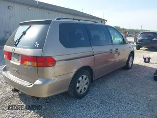 2003 Honda Odyssey EX-L z VIN 5FNRL18993B017733, wystawiony jako IAAI lot #42293386 z przebiegiem 86 659 mil mil oraz . Historia ofert i sprzedaży dostępna na DreamBid. Obrazek 4.