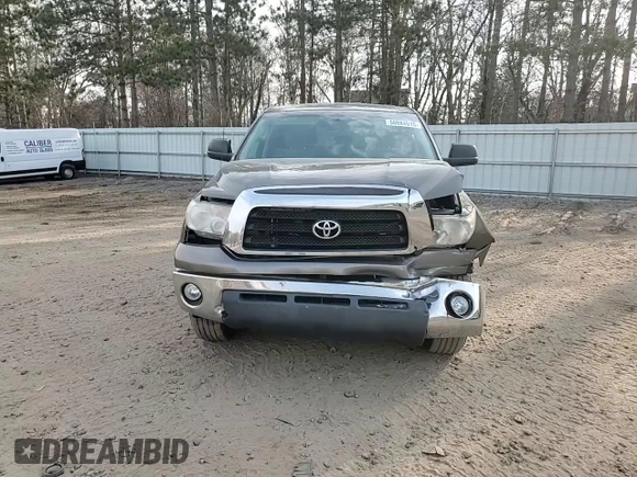 2009 Toyota Tundra z VIN 5TFBT54129X015491, wystawiony jako Copart lot #50884015 z przebiegiem 142 533 mil mil oraz Szkody całkowita. Historia ofert i sprzedaży dostępna na DreamBid. Obrazek 10.
