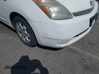 2006 Toyota Prius with VIN JTDKB20UX67527206, listed as a IAAI auction lot 42093925 with 124,256 mi miles. Bid and sale history available at carsss.com. Image 6.