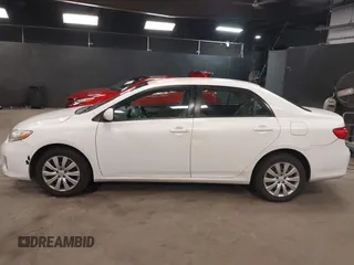2012 Toyota Corolla L with VIN 2T1BU4EE2CC855849, listed as a IAAI auction lot 42040963 with 156,639 mi miles. Bid and sale history available at carsss.com. Image 14.