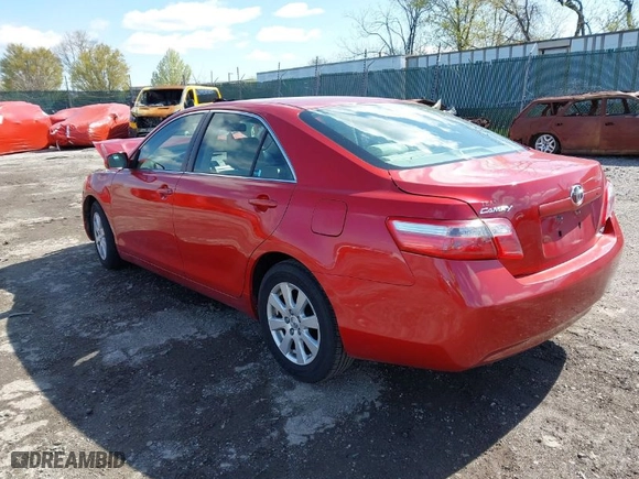 2007 Toyota Camry CE with VIN JTNBE46K573115563, listed as a IAAI auction lot 41971937 with 132,427 mi miles. Bid and sale history available at carsss.com. Image 3.