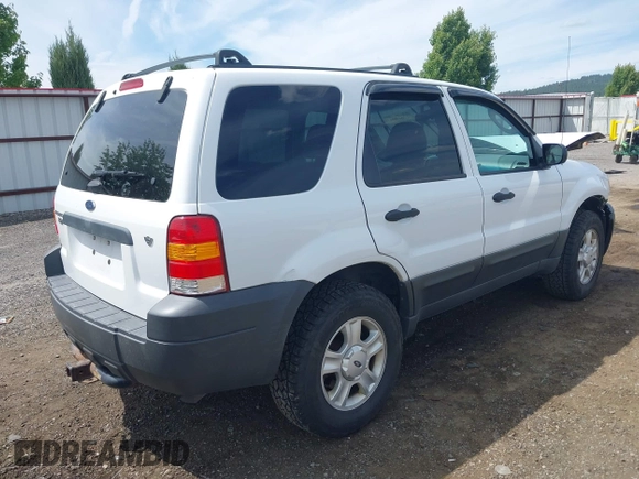 2006 Ford Escape XLT with VIN 1FMCU93106KA36063, listed as a IAAI auction lot 42610043 with 193,703 mi miles and . Bid and sale history available at DreamBid. Image 4.