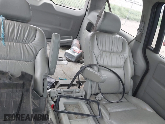 2007 Honda Odyssey EX-L z VIN 5FNRL38717B124209, wystawiony jako IAAI lot #42444334 z przebiegiem 230 123 mil mil oraz . Historia ofert i sprzedaży dostępna na DreamBid. Obrazek 8.