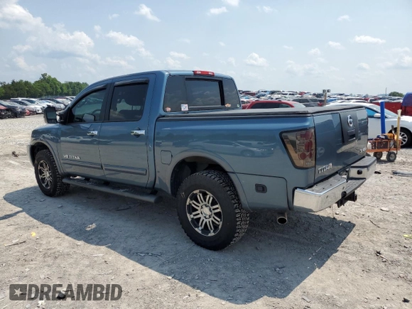 2011 Nissan Titan SL with VIN 1N6AA0EC4BN305296, listed as a Copart auction lot 59001395 with 194,557 mi miles and Salvage title. Bid and sale history available at DreamBid. Image 2.