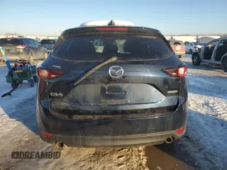 2021 Mazda CX-5 Touring with VIN JM3KFACM2M0329646, listed as a Copart auction lot 88217245 with 46,864 mi miles and Salvage Title. Bid and sale history available at carsss.com. Image 6.