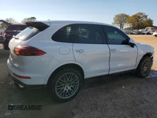 2018 Porsche Cayenne z VIN WP1AA2A2XJKA06647, wystawiony jako Copart lot #50317955 z przebiegiem 53 892 mil mil oraz Szkoda całkowita • Salvage title. Historia ofert i sprzedaży dostępna na DreamBid. Obrazek 3.