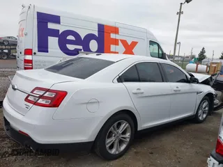 2018 Ford Taurus SEL z VIN 1FAHP2H81JG119145, wystawiony jako IAAI lot #41997302 z przebiegiem 61 467 mil mil oraz . Historia ofert i sprzedaży dostępna na DreamBid. Obrazek 13.