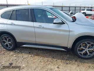 2019 BMW X1 sDrive28i with VIN WBXHU7C52K3H44360, listed as a IAAI auction lot 41709431 with 56,432 mi miles. Bid and sale history available at carsss.com. Image 14.