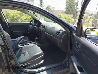 2009 Mercury Milan Premier with VIN 3MEHM02179R600636, listed as a IAAI auction lot 42638488 with 183,743 mi miles and . Bid and sale history available at DreamBid. Image 5.