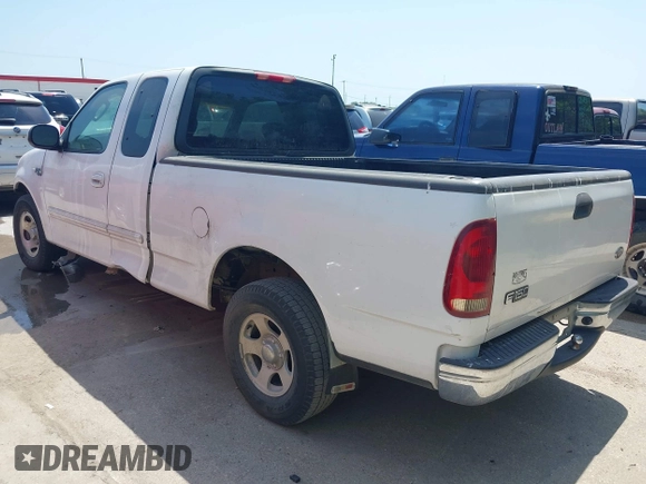 2003 Ford F-150 XL with VIN 1FTRX17243KA96403, listed as a IAAI auction lot 42017173 with 195,120 mi miles. Bid and sale history available at carsss.com. Image 3.