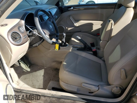 2015 Volkswagen Beetle with VIN 3VWH17AT3FM604193, listed as a Copart auction lot 72023304 with 49,958 mi miles and Salvage Title. Bid and sale history available at DreamBid. Image 7.