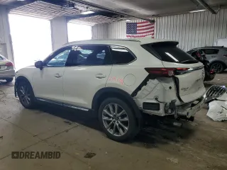 2017 Mazda CX-9 Grand Touring z VIN JM3TCBDY6H0142436, wystawiony jako Copart lot #59614265 z przebiegiem 76 833 mil mil oraz Czysty tytuł • Clean title. Historia ofert i sprzedaży dostępna na DreamBid. Obrazek 2.