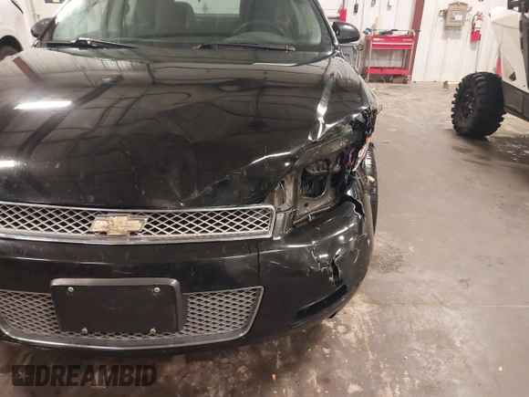 2014 Chevrolet Impala LT with VIN 2G1WB5E32E1127731, listed as a IAAI auction lot 42018987 with 163,649 mi miles and . Bid and sale history available at DreamBid. Image 6.