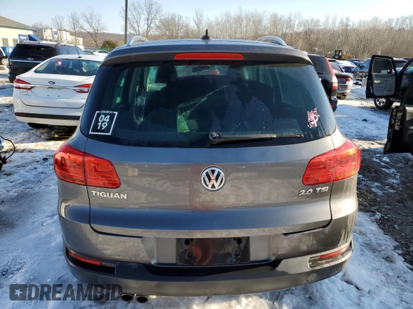 2014 Volkswagen Tiguan SE z VIN WVGAV3AXXEW505398, wystawiony jako Copart lot #41682155 z przebiegiem 137 147 mil mil oraz Nie do naprawy • Non repairable. Historia ofert i sprzedaży dostępna na DreamBid. Obrazek 6.