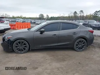 2014 Mazda 3 S Grand Touring with VIN JM1BM1W39E1145186, listed as a IAAI auction lot 41948404 with 111,702 mi miles and . Bid and sale history available at DreamBid. Image 14.