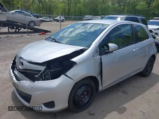 2014 Toyota Yaris L with VIN JTDJTUD38ED587118, listed as a IAAI auction lot 42211424 with 94,616 mi miles and . Bid and sale history available at DreamBid. Image 2.