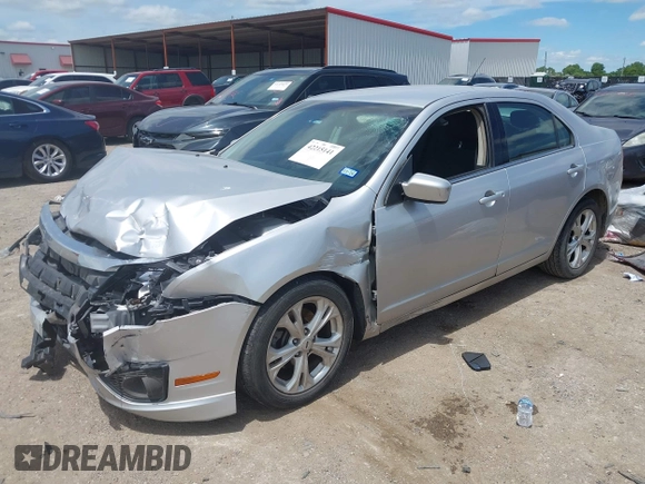 2012 Ford Fusion SE z VIN 3FAHP0HA8CR117122, wystawiony jako IAAI lot #42215141 z przebiegiem 158 703 mil mil oraz . Historia ofert i sprzedaży dostępna na DreamBid. Obrazek 17.