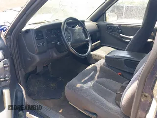 1998 Dodge Dakota SLT with VIN 1B7GL22X3WS569885, listed as a IAAI auction lot 42128994 with 1 mi miles. Bid and sale history available at carsss.com. Image 5.