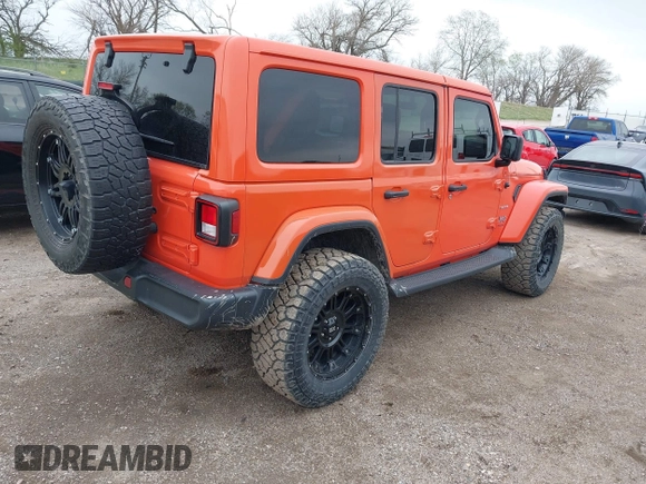 2020 Jeep Wrangler Unlimited Sahara with VIN 1C4HJXENXLW231194, listed as a IAAI auction lot 42083147 with 34,166 mi miles. Bid and sale history available at carsss.com. Image 4.
