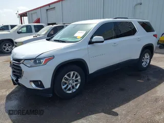 2018 Chevrolet Traverse LT Cloth with VIN 1GNERGKW4JJ144479, listed as a IAAI auction lot 41839641 with 136,404 mi miles. Bid and sale history available at carsss.com. Image 2.
