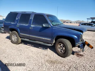 2000 Chevrolet Tahoe Z71 with VIN 1GNEK13R7YR152646, listed as a Copart auction lot 79464414 with 199,966 mi miles and Salvage title. Bid and sale history available at DreamBid. Image 4.
