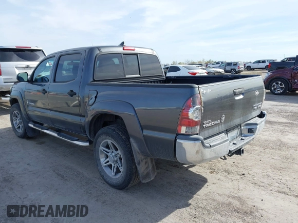2014 Toyota Tacoma PreRunner with VIN 3TMJU4GN1EM156845, listed as a IAAI auction lot 40972570 with 65,138 mi miles. Bid and sale history available at carsss.com. Image 3.