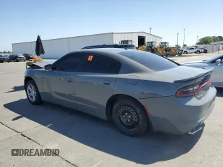 2019 Dodge Charger SXT with VIN 2C3CDXBGXKH659890, listed as a Copart auction lot 58011735 with 112,293 mi miles and Salvage title. Bid and sale history available at DreamBid. Image 2.