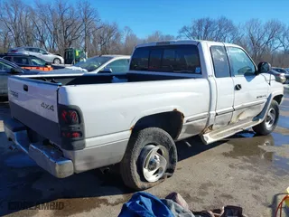 1998 Dodge Ram 1500 with VIN 3B7HF13Z2WG130254, listed as a IAAI auction lot 41323066 with 204,006 mi miles. Bid and sale history available at carsss.com. Image 4.