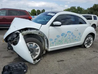 2019 Volkswagen Beetle S with VIN 3VWFD7ATXKM705515, listed as a Copart auction lot 73321354 with 64,708 mi miles and Salvage Title. Bid and sale history available at carsss.com. Image 1.