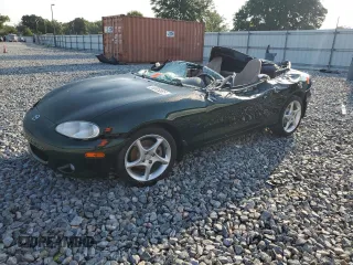 2002 Mazda MX-5 Miata Cloth z VIN JM1NB353X20231155, wystawiony jako Copart lot #55805865 z przebiegiem Nie podano mil oraz Szkoda całkowita • Salvage title. Historia ofert i sprzedaży dostępna na DreamBid. Obrazek 1.