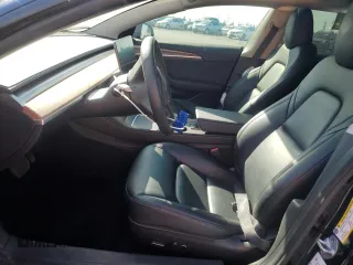 2023 Tesla Model 3 z VIN 5YJ3E1EA4PF707099, wystawiony jako Copart lot #52531035 z przebiegiem 57 723 mil mil oraz Szkoda całkowita • Salvage title. Historia ofert i sprzedaży dostępna na DreamBid. Obrazek 7.