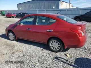2014 Nissan Versa SV with VIN 3N1CN7AP9EL843193, listed as a Copart auction lot 79597814 with 183,308 mi miles and Salvage Title. Bid and sale history available at DreamBid. Image 2.