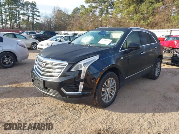 2019 Cadillac XT5 Luxury FWD z VIN 1GYKNCRSXKZ102866, wystawiony jako IAAI lot #41335840 z przebiegiem 59 563 mil mil oraz . Historia ofert i sprzedaży dostępna na DreamBid. Obrazek 17.